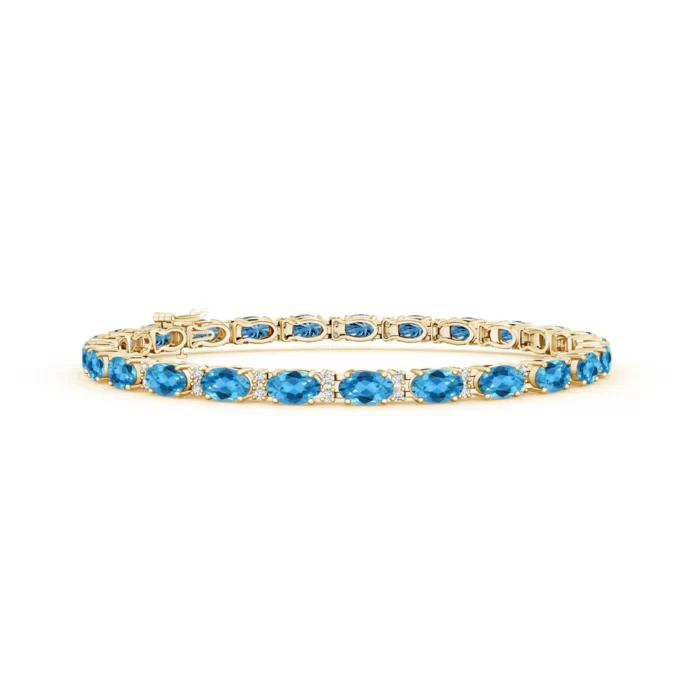 5x3mm aaa swiss blue topaz yellow gold bracelet 1